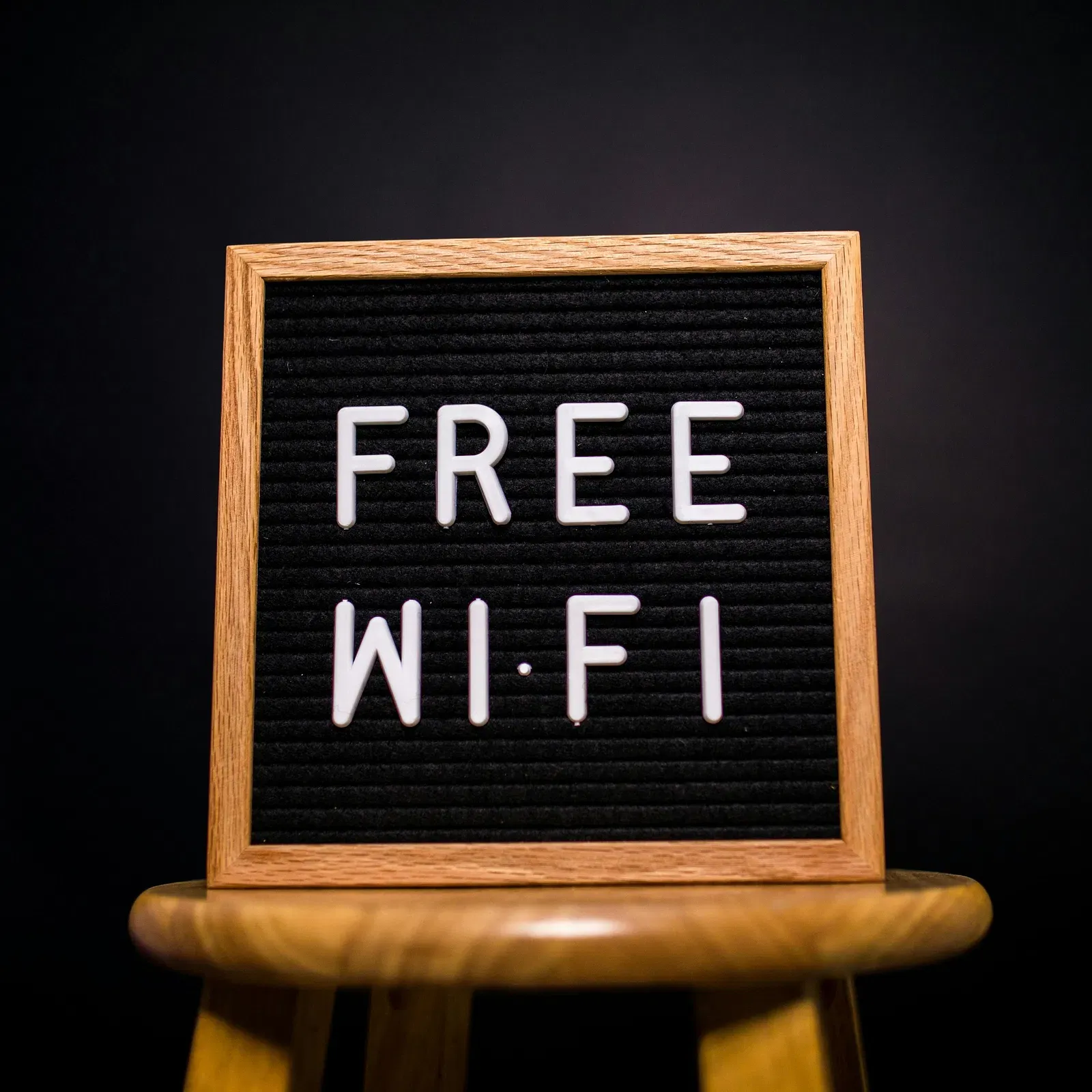 A board with Free Wi-Fi written on it