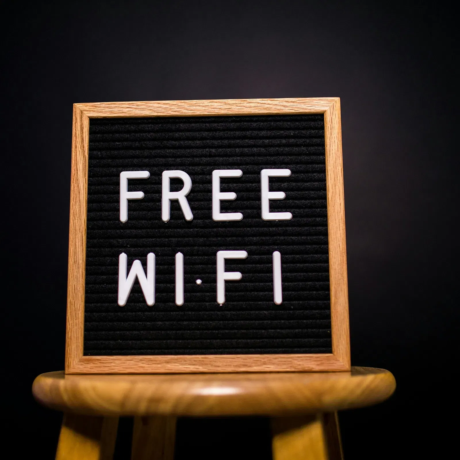 A board with Free Wi-Fi written on it
